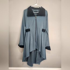 "Light Blue Jacket with Black Accent. A Modern Touch and Unique Elegance"